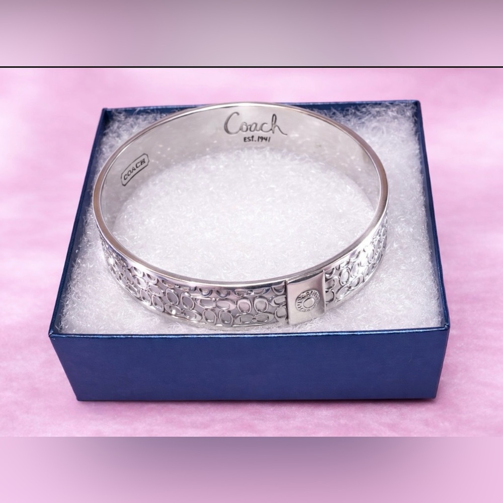 Quiet Luxury Silver Tone Cuff Bracelet with Intricate “C” Design - Picture 2 of 6